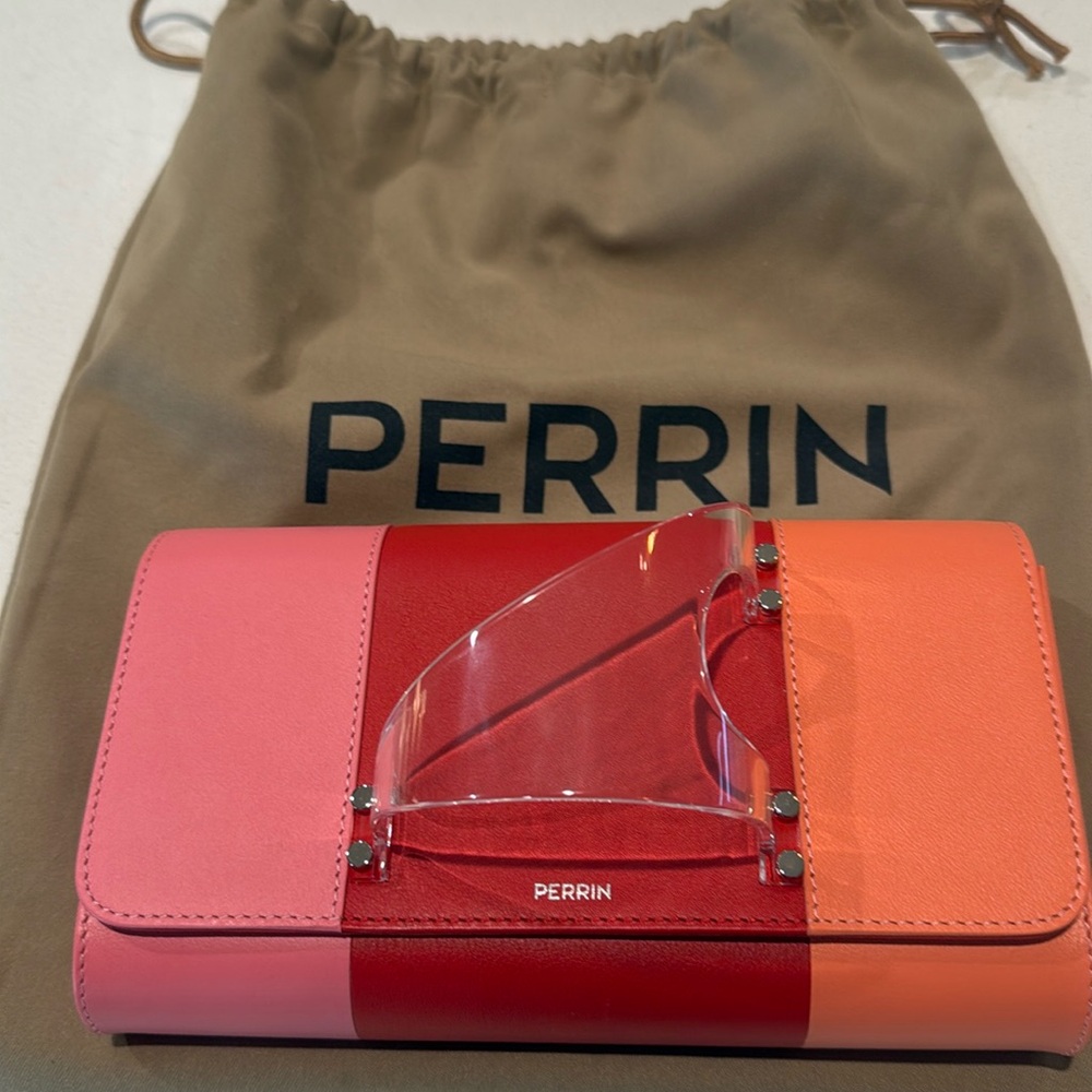 Perrin Clutch. Like new- worn once! Red, pink, orange